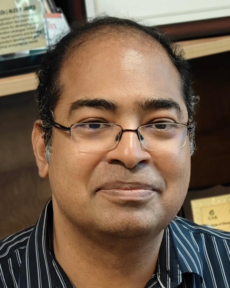 Dr. Alex James headshot